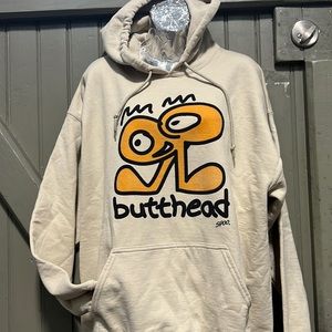 Vintage design on new hoodie. Sand color hood printed with water based ink.